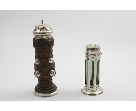 AN EDWARDIAN ART NOUVEAU SUGAR CASTER cylindrical with a spreading foot, a bayonet-fitting cover, pierced sides and a green g