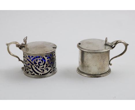 AN EARLY VICTORIAN DRUM MUSTARD POT with scroll piercing, crested, by Messrs. Barnard, London 1838 and an engine-turned drum 