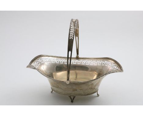 A GEORGE V SWING HANDLED BASKET with pierced and reeded decoration and four feet, by William Hutton &amp; Sons, Sheffield 191