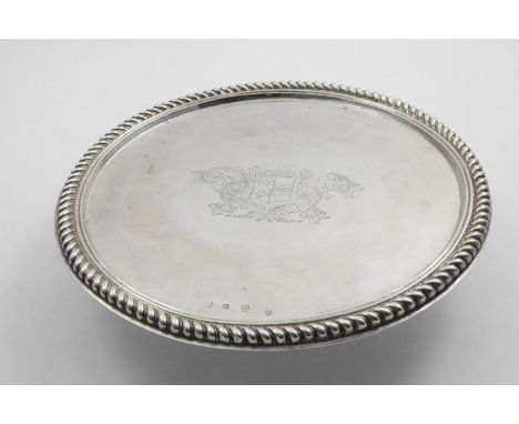 A WILLIAM &amp; MARY LARGE CIRCULAR TAZZA with a trumpet-shaped foot and moulded borders of gadrooning, the centre engraved w