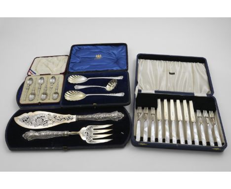 FOUR CASED SETS:- A pair of Victorian fish servers, initialled, by George Adams, London 1868, (loaded handles), a late Victor