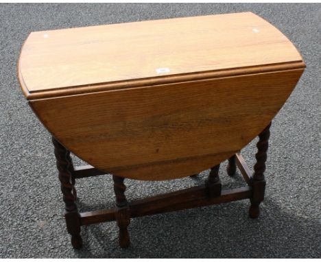 Barley twist oak gate leg table.
