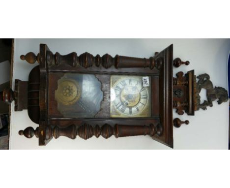 19th Century walnut Vienna wall clock with horse top. 