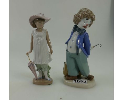 Nao figure of a comical boy dressed as a clown and girl standing with hat & umbrella, both boxed  (2)