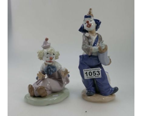 Nao porcelain figure of Clown playing accordion and seated clown with ball, one boxed (2)