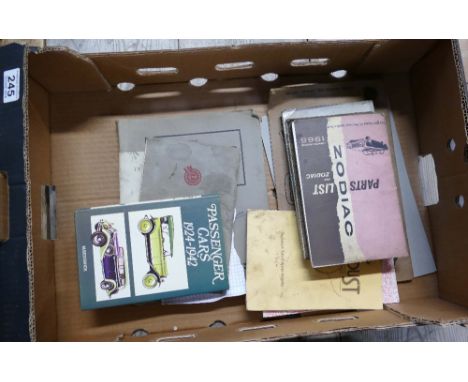 A collection of vintage 1940's car manual and booklets for the Austin Morris minor. 