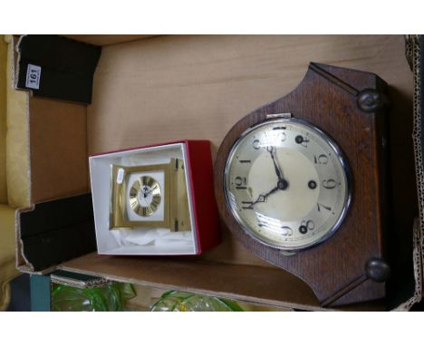 A collection of items to include Oak cased art deco mantle clock and boxed Swiza brass mantle clock. (2)