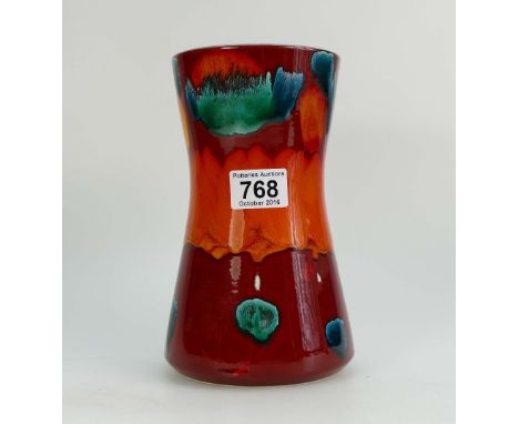 Poole pottery hand thrown vase decorated in orange, green and red abstract colours, height 22cm