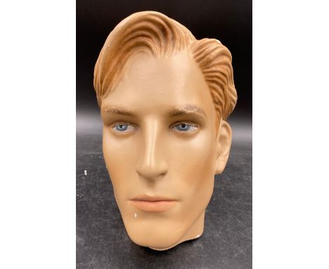 Plaster mannequin head of a young man, 26cm high. 