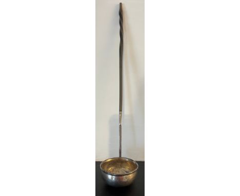 A white metal and baleen toddy ladle, initialled to front. Length 32.5 cms. 