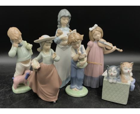 A collection of Lladro Nao figurines to include  "Hush", "Boy on the Phone", "Girl with Puppy", "Girl with basket of flowers"