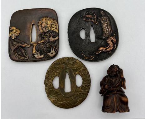 Three Japanese Tsuba 8 x 7.5cm approximately, together with a wooden netsuke. 