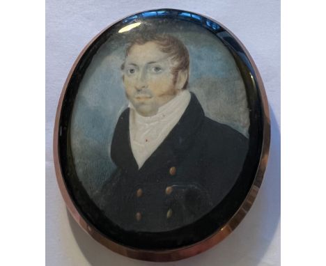 A portrait miniature on ivory of a gentleman with hair work and monogram to reverse. Size 8.5 x 7cm. Ivory submission referen
