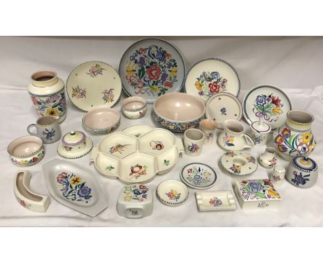An assortment of 1950s and 1960's Poole pottery with various patterns, Le pattern, CS pattern, Fuchsia pattern etc. to includ
