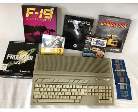 Boxed Atari console with F-19 Stealth Fighter, Psygnosis, Grand Prix, Frontier Elite II, Lombard Rally plus a collection of l