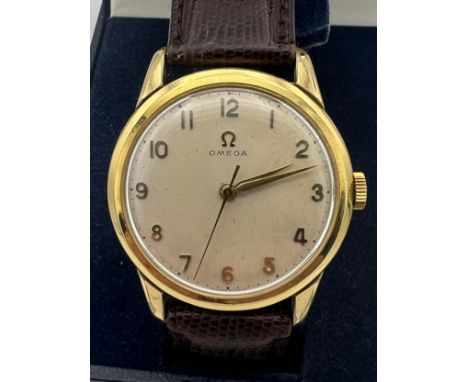 A Gentleman's Omega manual wristwatch, cream face with leather strap. case diameter measures approx. 35mm. 