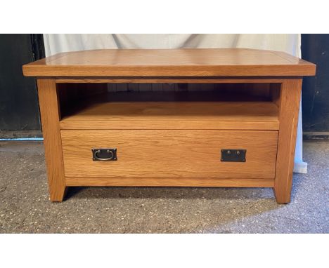 Oak TV stand with shelf and one long drawer. 57 h x102 w x 51cm d. 