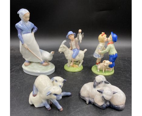 A collection of Royal Copenhagen Denmark to include a pair of resting lambs no.2769, lambs playing no.759, Girl with goose ho