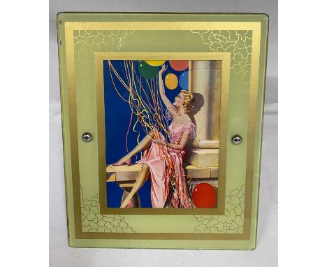 Glass covered print of a lady with balloons total size 31cm x 25cm, wooden back with stand. 