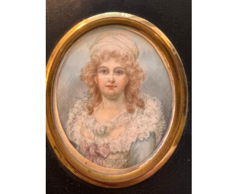 A portrait miniature on ivory of Mrs Montgomery circa 1800. Frame size 13 x 11cm. Ivory submission reference GXQAB5RF. 