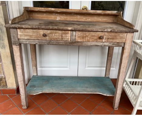 Two drawer beech washstand with upstand and lower shelf.  105cm w x 48cm d x 99cm h. 