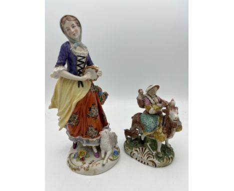 Two 19thC Sitzendorf figures to include mother and three children riding a goat to market. 