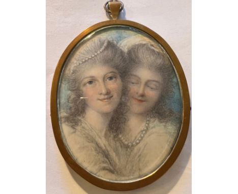 A portrait miniature on ivory of two young ladies. Size 8 x 6.5cm. Hair to reverse. Ivory submission reference FV1GWPEF. 