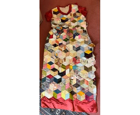 A 19thC silk patchwork dress with sash ‘My Great Aunt’s Legacy’. 133cm l. 