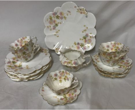 The Foley china an early 20th Century English fine bone china tea service to include 5x cups, 6x saucers, 6x side plates, 1 m