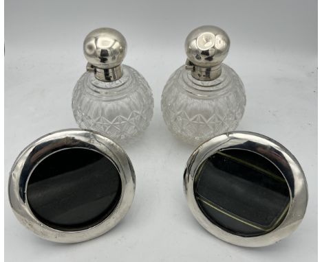 Silver items to include a pair of scent bottles William Hutton &amp; Sons Ltd, London 1895 and pair of picture frames, Birmin