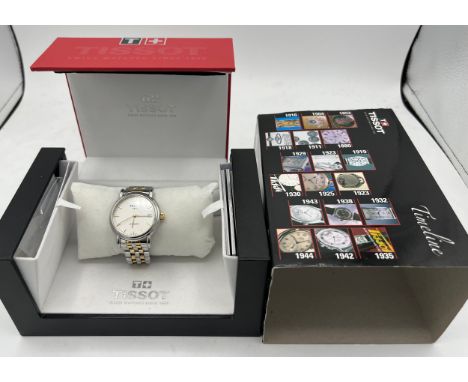 A boxed Tissot 1853 Gentleman's Bracelet Watch, in original box and outer case. Case diameter 35mm. 