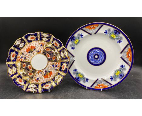 A Davenport plate with blue band, floral gold scrolls and Worcester Royal Lily pattern plate. Larger 27cm d. 