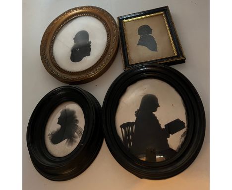 Four framed 19thC oval portrait silhouettes. Largest 17.5 x 15cm. 