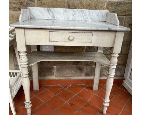 Painted washstand with marble top and upstand. Single drawer to front and shelf beneath. 80cm w x 45cm d x 90cm h. 