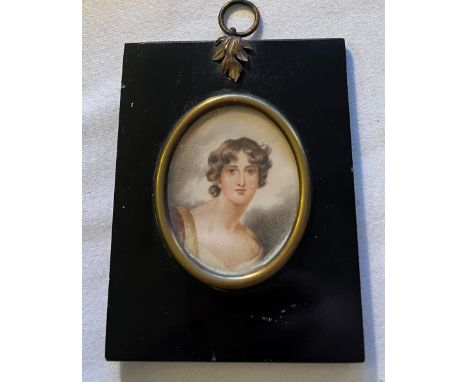 A portrait miniature on ivory of a young lady. Frame size 11.5 x 9 cm. Ivory submission reference W34HBRGU. 