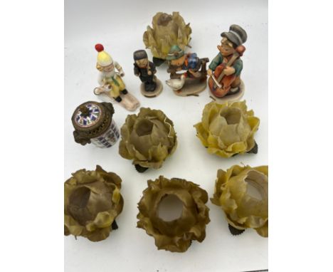 A quantity of continental ceramics to include Katshaus, Hummel, Sèvres lidded pot and German lamp shades etc. 