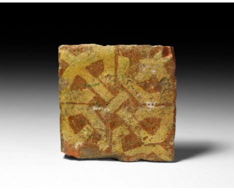 15th-16th century AD. A rectangular ceramic floor tile with cream interlace pattern, French workmanship.831 grams, 14 x 14cm 