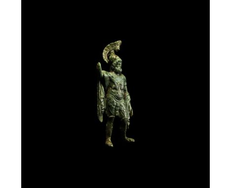 2nd-3rd century AD. A substantial bronze figurine, finely modelled as the god Mars, bearded and clothed in a military tunic a