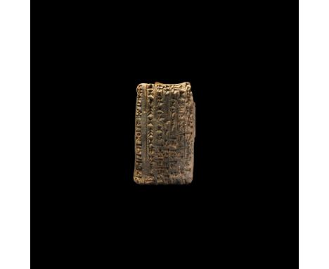 17th-15th century BC. A ceramic tablet with cuneiform text to one face; accompanied by an old scholarly note, typed and signe