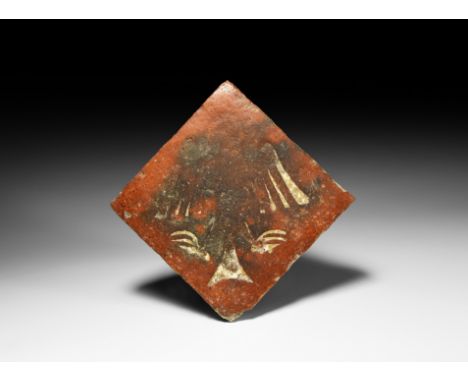 Late 13th-14th century AD. A rectangular ceramic floor tile with white eagle motif; from St Etheldreda's Church, West Quantox