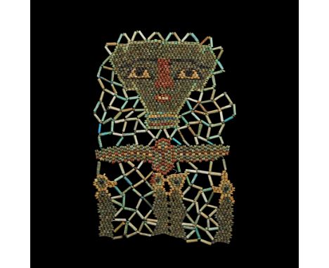 Ptolemaic Period, 332-30 BC. A restrung netted beadwork panel of annular and tubular glazed composition beads in blues, green