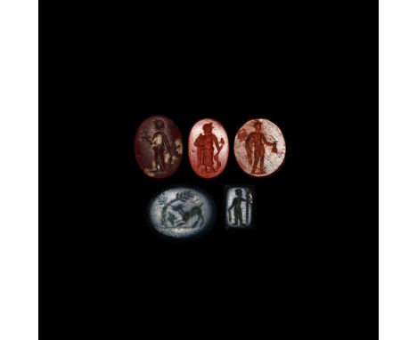 Mainly 2nd-3rd century AD. A mixed group of carnelian and nicolo ellipsoid and rectangular gemstones with intaglio motifs of 