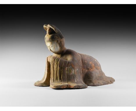 Tang Dynasty, 618-907 AD or later. A ceramic figure modelled as a court official in headdress and robes adopting the prostrat
