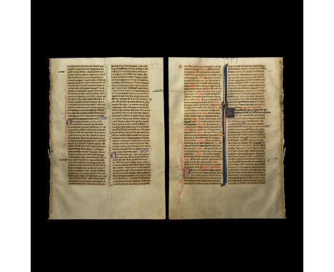 Early 13th century AD. A vellum leaf from a manuscript bible with text in two columns of black lettre batarde script with dec