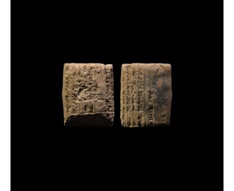 14th-13th century BC. A ceramic tablet fragment with low-relief cuneiform text in eight columns to the obverse, six to the re