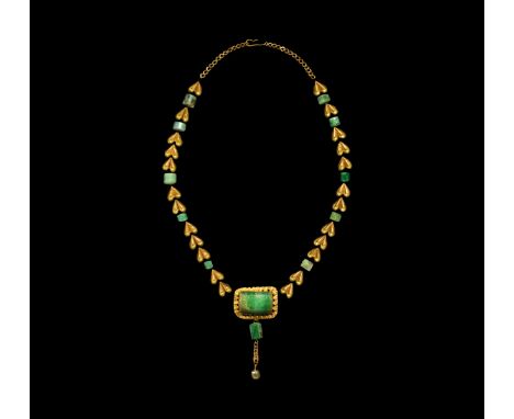 2nd century BC-3rd century AD. An assemblage of gold necklace elements comprising: twenty-four heart-shaped leaves modelled i