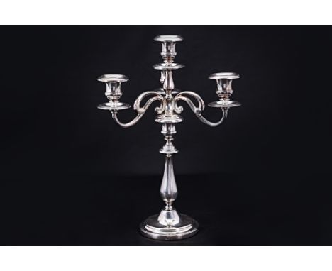 A CHRISTOFLE SILVER-PLATED CANDELABRA
18th Century style four-light candelabra with baluster central stem and winding branche
