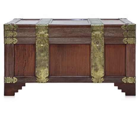 A BRASS BOUND CAMPOR TRUNK
Rectangular with hinged cover on stepped bracket feet, with interior tray, teh brass mounted engra