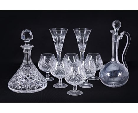 A GROUP OF GOOD QUALITY CUT TABLE GLASS AND DECANTERS
Comprising: a ship's decanter; a claret jug; a set of six brandy balloo