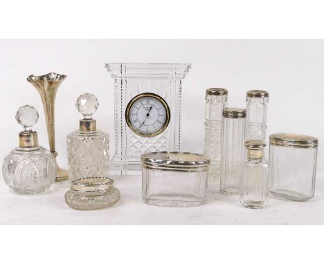 A Waterford Crystal mantel clock having quartz movement, height 18cm, together with various glass dressing table jars with si